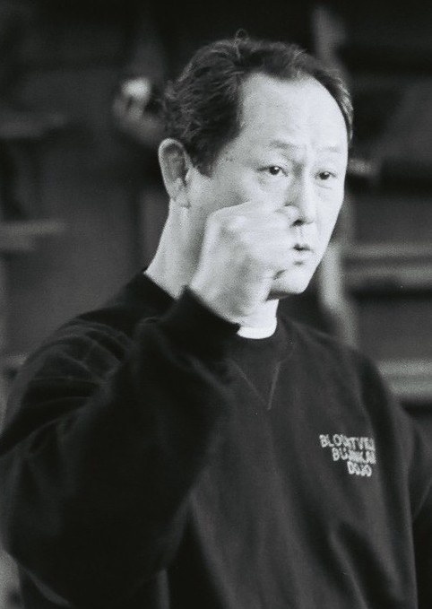 Nagato sensei doing a martial arts technique in Honbu Dojo